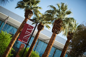 Palm trees and U.N.L.V. banner