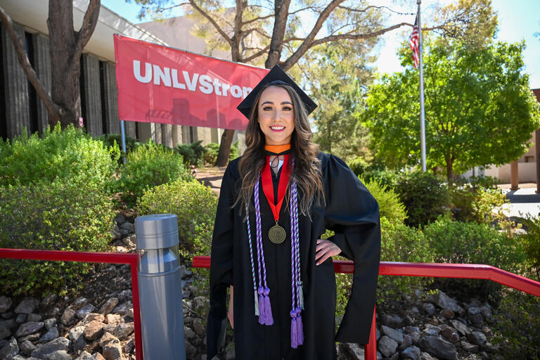 woman in graduation cap and gown